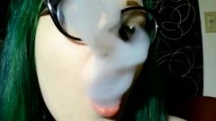 Punk Green Haired Girl Smoking In Glasses