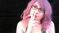 Coco Smoking With Pink Hair And Glasses