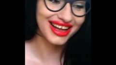 Busty Woman With Glasses Opens Mouth And Sucks Kisses