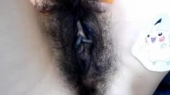 Stunning Hairy Teen With Glasses Fingering Her Nasty Pussy