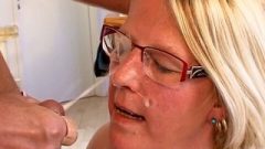 Enormous Belly Blonde In Glasses Takes A Facial