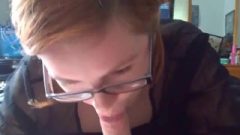 Adorable Teenager With Glasses Giving A Blowjob
