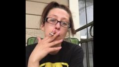 Nerdy Goddess D Smokes Cork Tip 211 Cigarette In Batman Shirt And Glasses